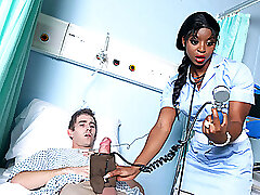 Spectacular and sweet black nurse is taken care of her patient's big cock.