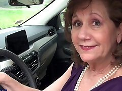 Brunette Demi wearing dark-hued lingerie pleasuring her shaved cunt