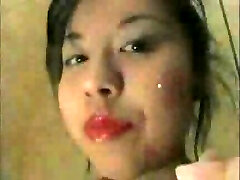 Asian girl gobbling window