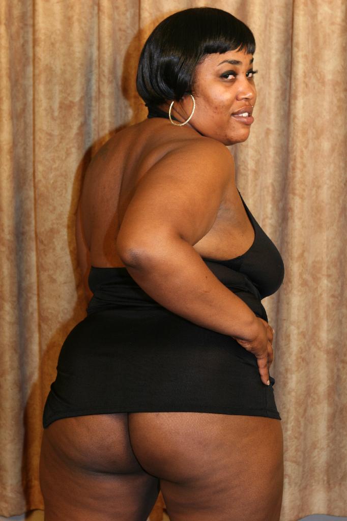 Horny ebony BBW Sasha showing off her huge belly while ...