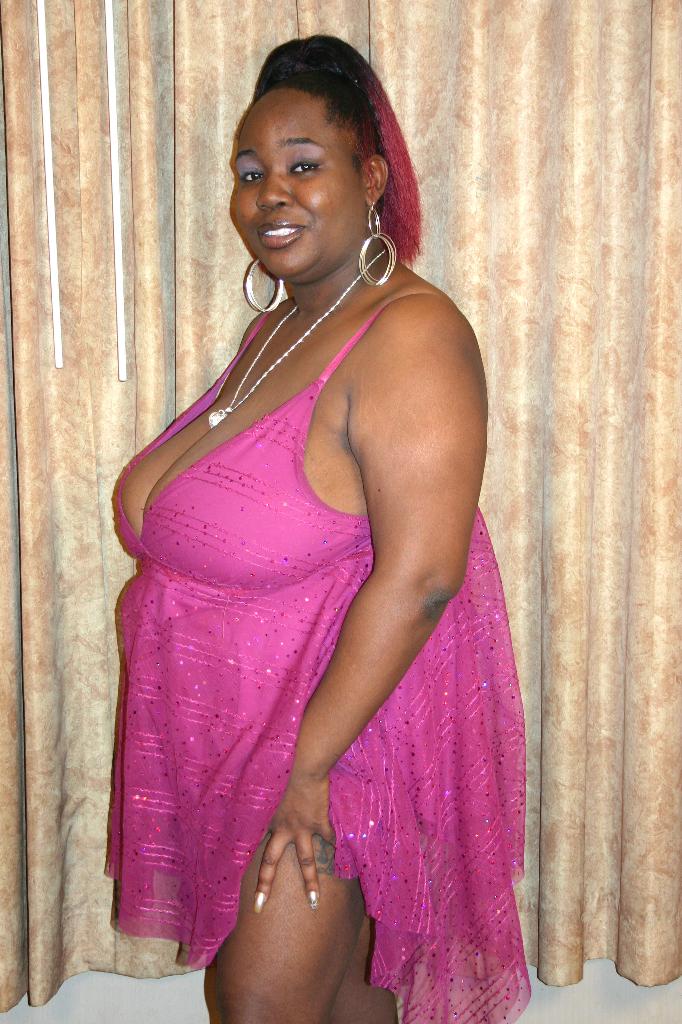 Ebony BBW model flaunts her big tits and taking a big black ...