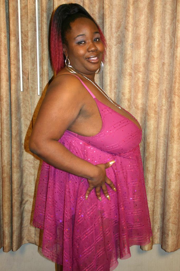 Ebony BBW pornstar shows off her big floppy tits and massive ...