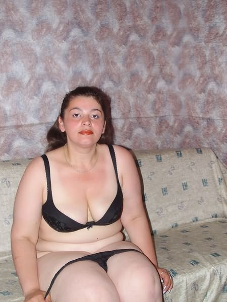 Brunette Fat Girl Teasing and Undressing Stockings