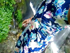 Alexa Cosmic swimming in beautiful waterfall wearing colorful combi dress...