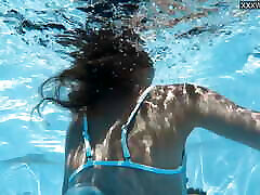 Captivating Bonnie Dolce swimming naked