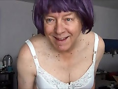 Gigi modeling purple wig housewife skandal corsette bra