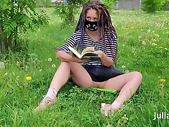 Masked bookworm Julia Meow teasing with her blonde small soles in public