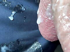Suited and booted, shooting a big creamy load.