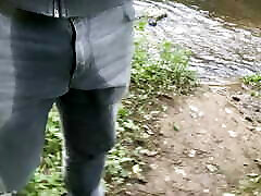 Walking into a river fully clothed and piss wet