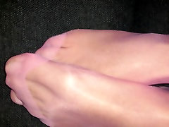 Pink nylonfeet relaxing