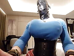 Huge tits hooded sissy fucktoy in tight corset