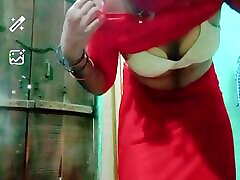 Indian Gay Crossdresser Gauri Sissy XXX Video Call in Red Saree Showing His Boobs and Bra Strap