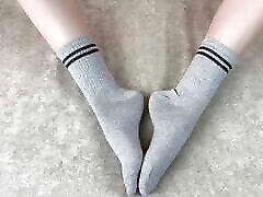 Girl in download xxx beeg strokes her legs in gray cotton socks