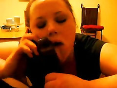Cheating wifey eating cum on Phone With Husband While Sucking a BBC