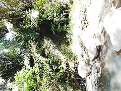 Masturbation by a tropical river and huge and thick cumshot on a stone