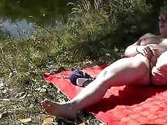 MILF solo. Wild beach. 3 man 1 women sex nudity. Sexy MILF on river bank fingers wet pussy and has strong orgasm. Naked in public. Outdoors