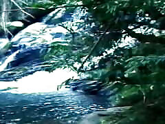 Vintage video of two hot guys having sex near river