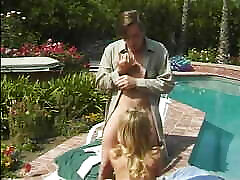 Blonde teen in cheerleader moans hard doggy gets pounded by the pool