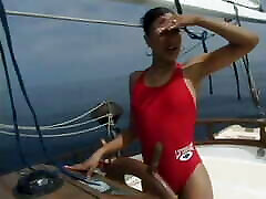 White guy fucks ebony chick with a big ass on a boat