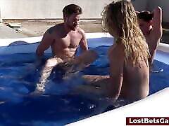 Hard threesome sex in the pool after these girls lost a strip volleyball game