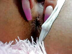 Horny whore with an angelic face masturbates live like the nymphomaniac she is, while stimulating her pussy and anus