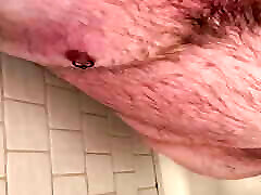 Compilation: Uncut gay bear gives himself a golden shower all over his hairy chest and belly