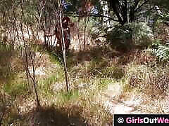 Hot red haired hitchhiker has lesbian sex in nature