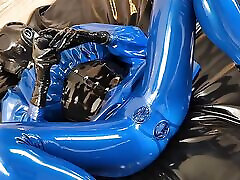 OnlyFans teaser - Blue latex catsuit with integrated vaginal and anal condoms!