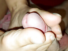 Mature amateur housewife gives her peachy legal a footjob with her sexy feet and toes