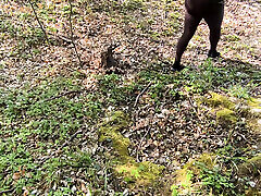 Naked on the railway track beating her breasts