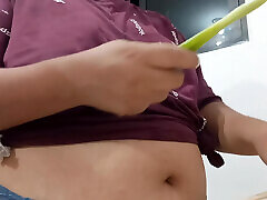 Chubby mother-in-law in the kitchen in underwear