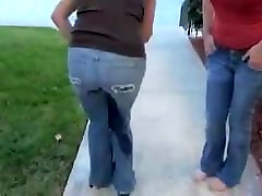 Two girls wet their jeans