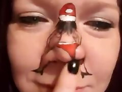 Dancing Santa on girl&039;s nose