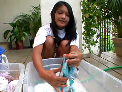 Kat Young is washing her clothes in front of first time asex outdoor
