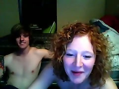 Curly haired slutty MILF is gonna have nasty real homamde family sex with her guy on webcam