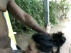 White indian desi original wench performs sloppy deep throat to black man outdoors