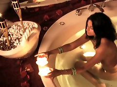 Fuckable Indian milf strokes her delicious body in hot tub