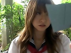 Kinky Japanese student Mika Orihara pulls up skirt and shows her butt