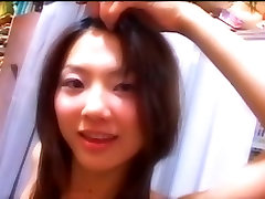 Funny chick from Japan Hitomi Aizawa gonna be a lezdom sex tube star
