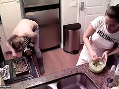 Mesmerizing lesbian cooks dinner with bare tits in front of her GF