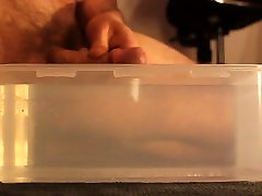 Cum inside plastic container with hot Water