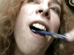 Dirty girl even cleans her teeth with cum