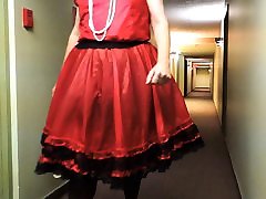 Sissy Ray in Hotel Corridor in Red Sissy Uniform