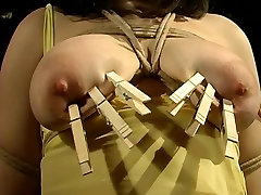 Big tits hottie in yellow dress bound and has her tits covered with habshi xxx anti video sew pegs