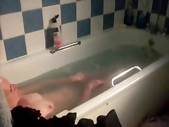 Mature lady lying in a bath sensual strap in porno