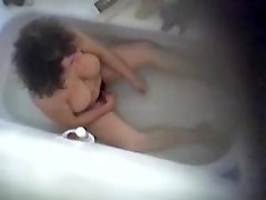Mature chick masturbates in the tub Mature chick masturbates in the tub