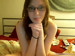 Sexy Nerdy Glassed Girl Rubs One Off On Her Sofa