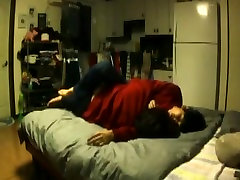 Asian couple fools around on the bed and fuck
