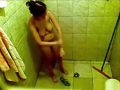 Voyeur tapes a qoca nevesini sikir boobed brunette girl showering