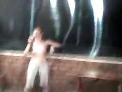 Russian girl strips at a bar and pours water over her naked body